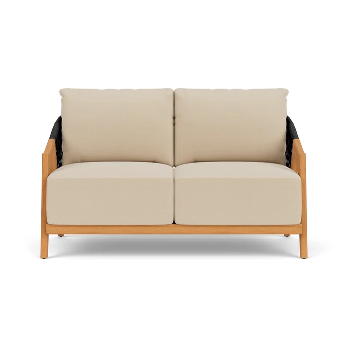alpine loveseat in natural teak finish with raindrop almond fabric grade b