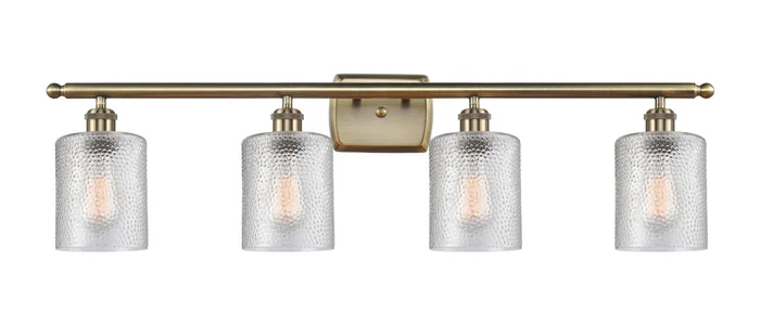 Ballston Four Light Bath Vanity in Antique Brass (405|516-4W-AB-G112)